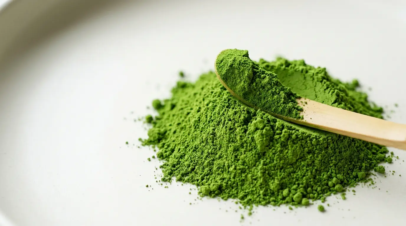 Fresh matcha with a bamboo scoop